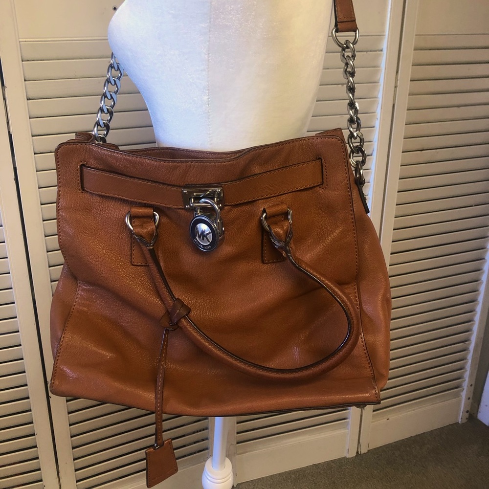 Michael Kors tan leather dual strap bag.
